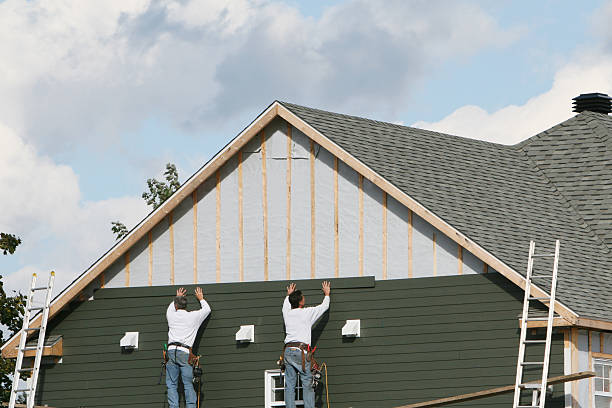 Professional Siding technician working in Wakefield, MA